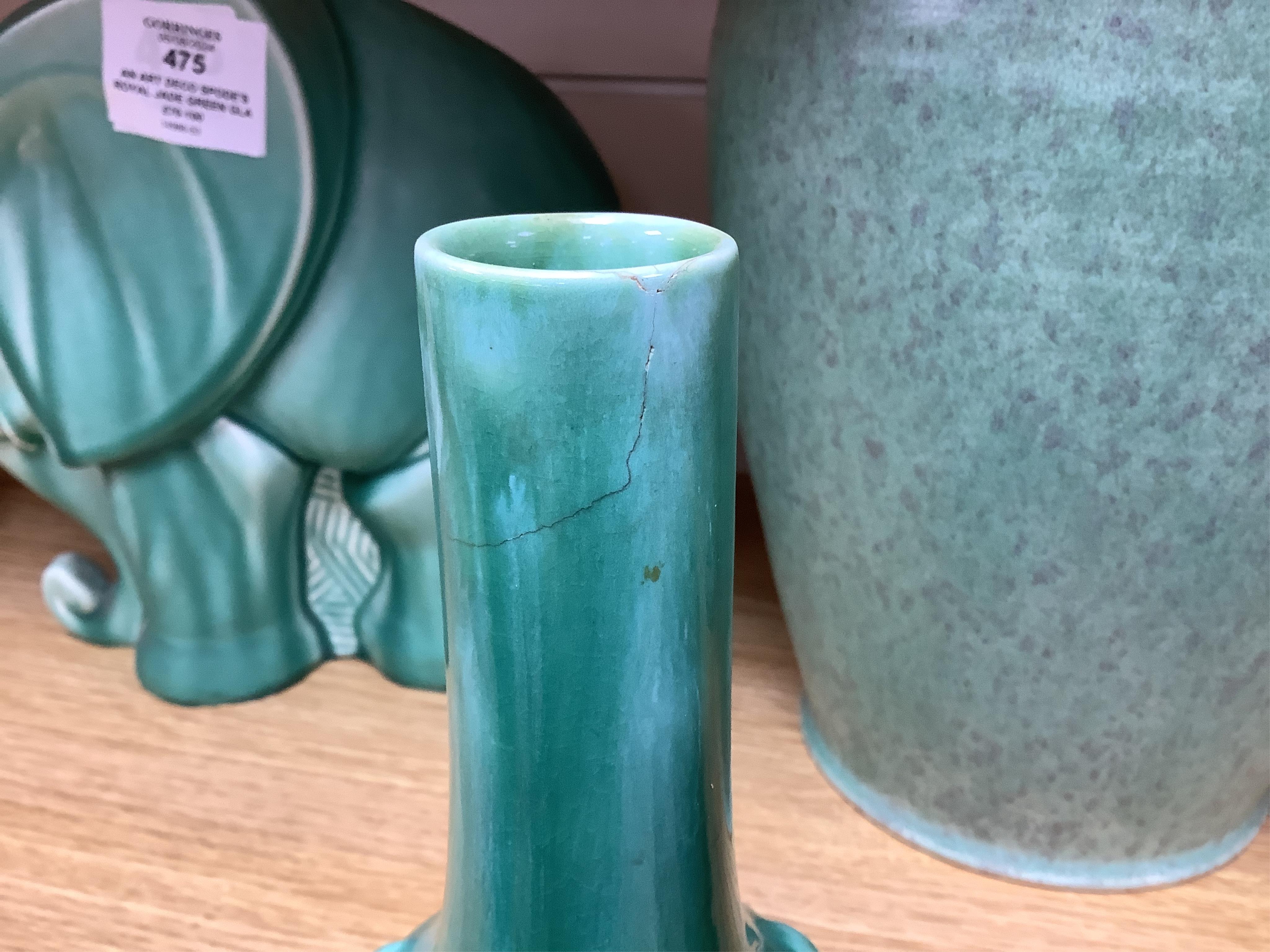 An Art Deco Spode's Royal Jade green glazed model of an elephant and four other pieces of Poole, Royal Lancastrian and Wedgwood, tallest 29cm. Condition - good